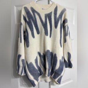 Large cream sweater with abstract blue lines